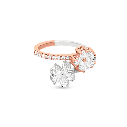 Unique 18K Two-Tone Gold Flower Motif Ring With Sparkling Diamond Accents And Pear Diamonds In The Center Of An Art.